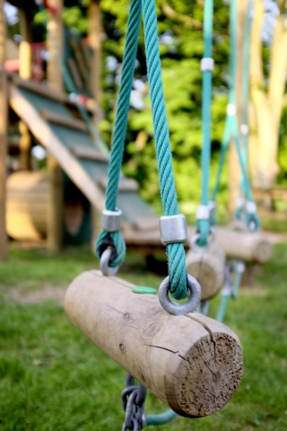 Wooden swing steps and the activity tower