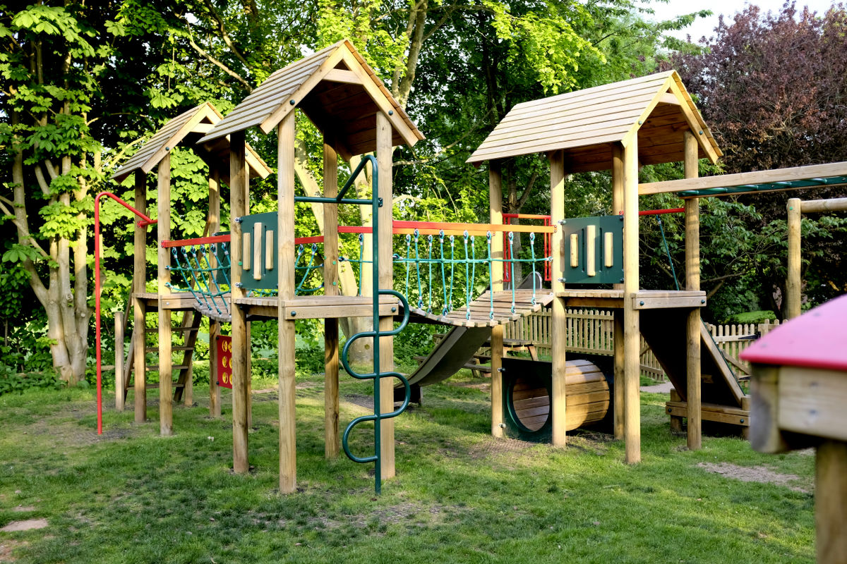 A view of the wooden activity centre and climbing frame