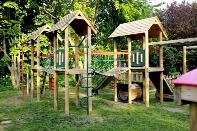 A view of the wooden activity centre and climbing frame
